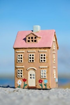 Hus Nyhavn blomster og lyserødt tak